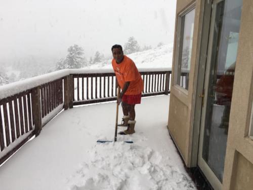 Gary-parents-house-in-Estes-Park-shoveling-snow